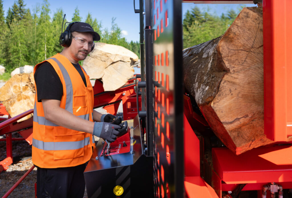 An operator with the X Firewood factory